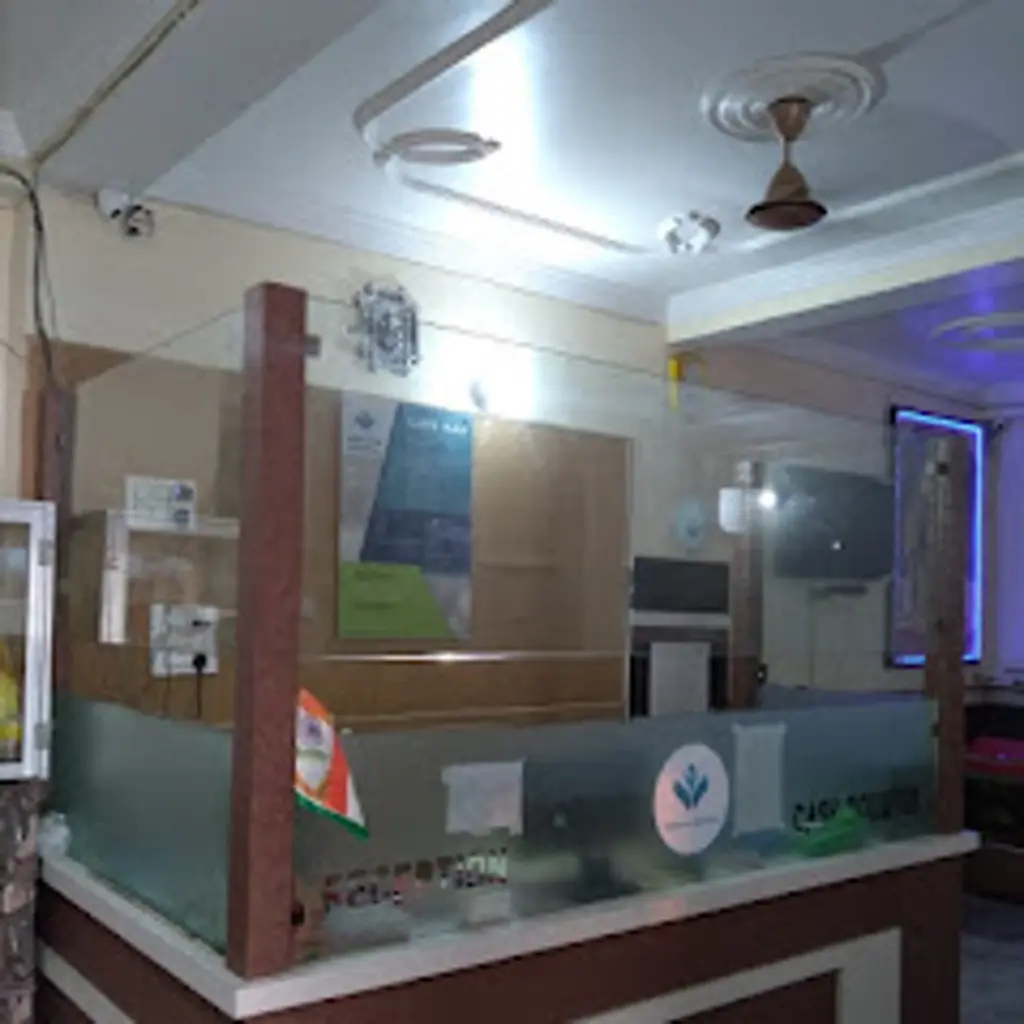 Patient submitting documents at the Ayushman Card Hospital in Sipara, Patna